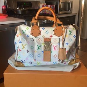 Stunning super white nice and clean of course authentic white Louis Vuit…